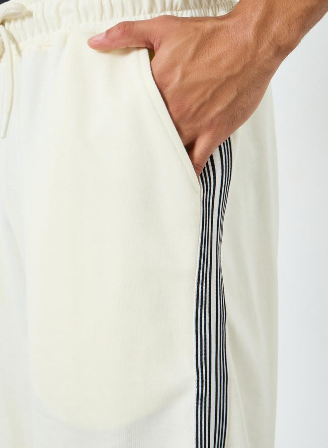 Styli Men Off-White Striped Terry Oversized Shorts - Image 2